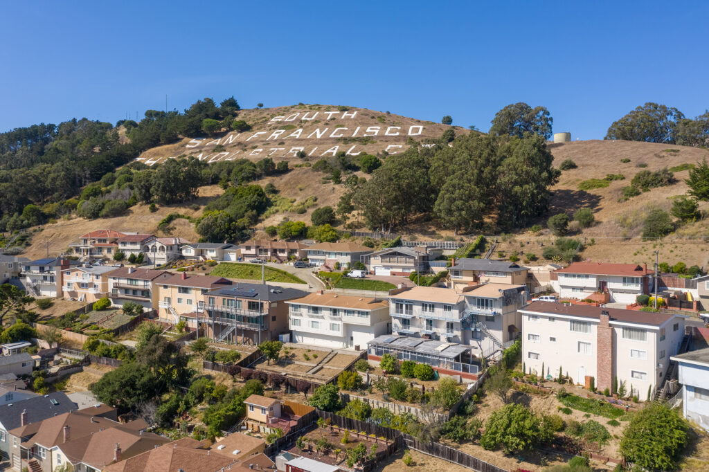 Rooftop View of mountain and town.
