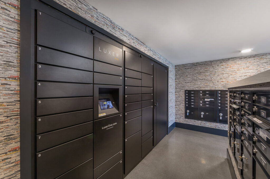 Mail room with LUXER One package lockers.